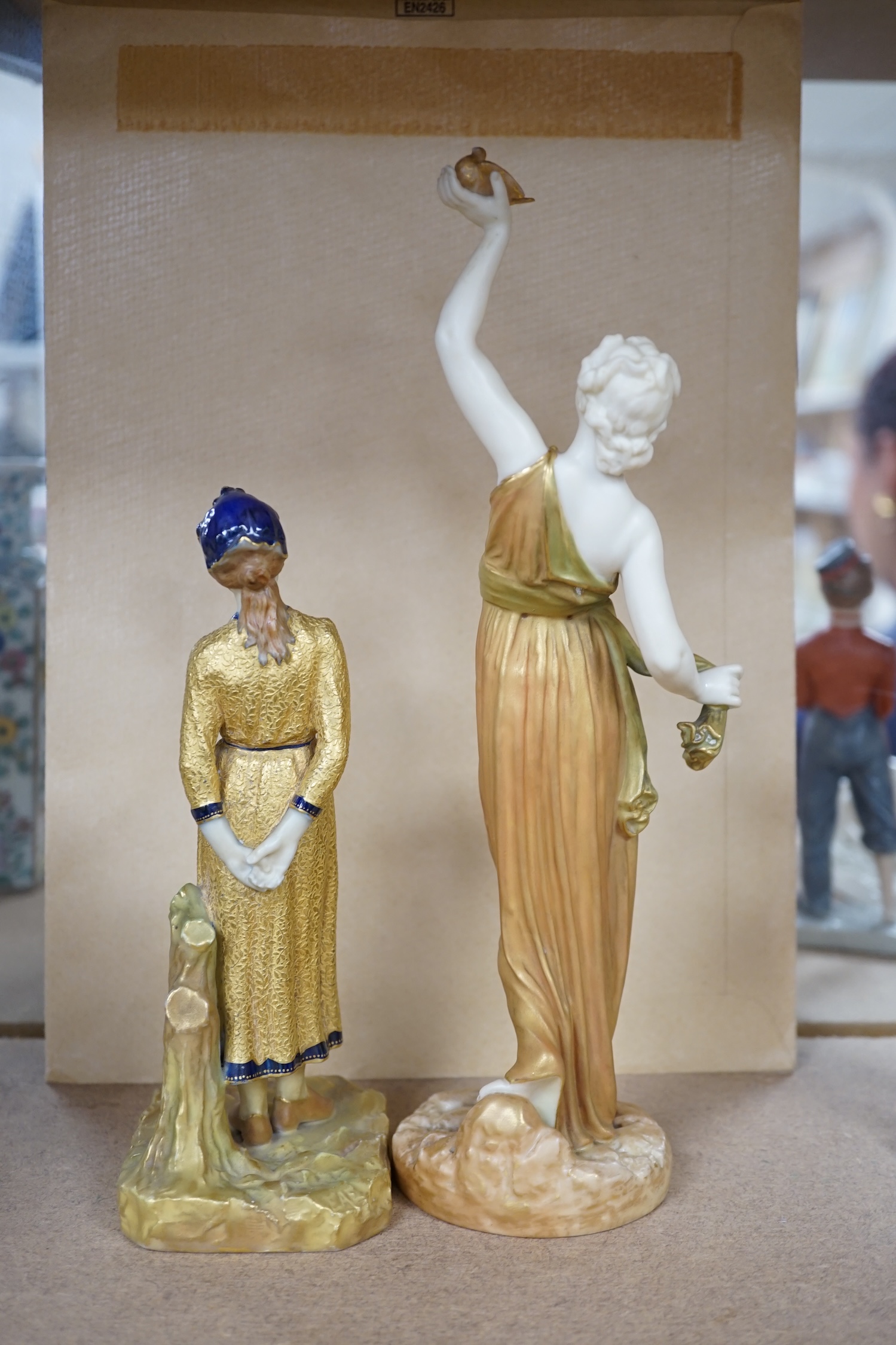 Two Royal Worcester partially gilt figurines including 2214, largest 16cm high. Condition - good